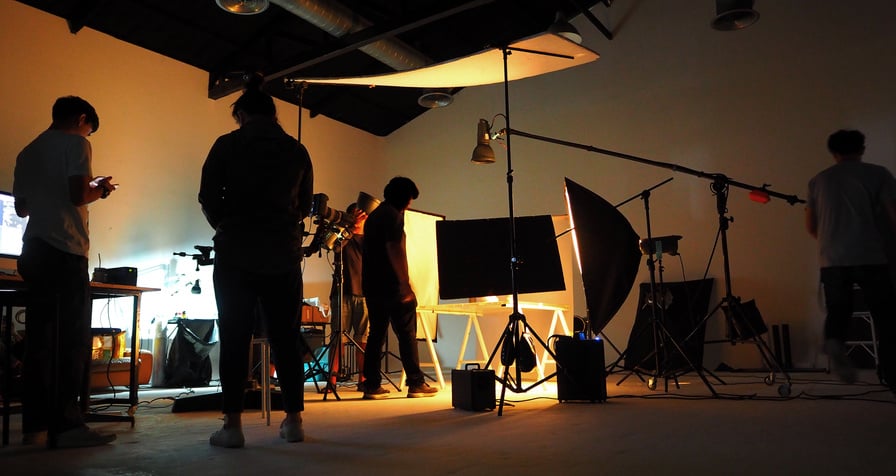 Silhouetted Production Team Shooting Video 